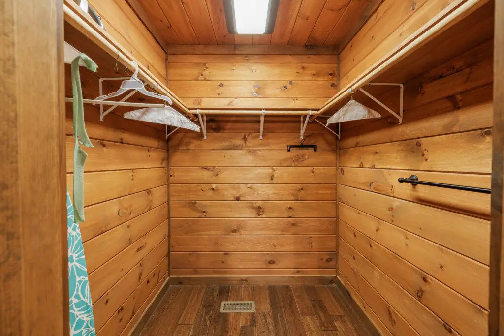 Above the Clouds cabin master bedroom walk-in closet with cedar walls in Blue Ridge Georgia