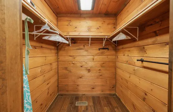 Above the Clouds cabin master bedroom walk-in closet with cedar walls in Blue Ridge Georgia